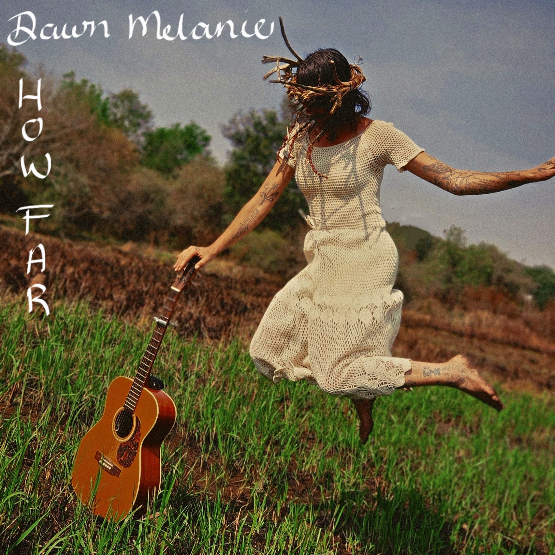 A girl leaping in the air with a guitar in hand